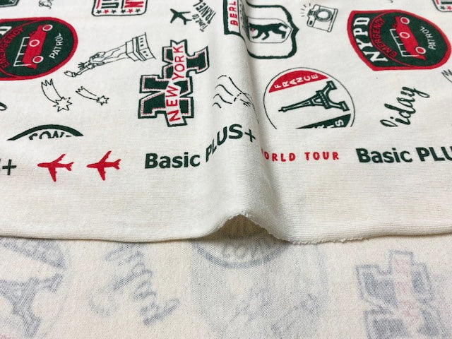 30/-CMプレーティング天竺ニット ワールドツアー柄　エクリュ×グリーンマーズ