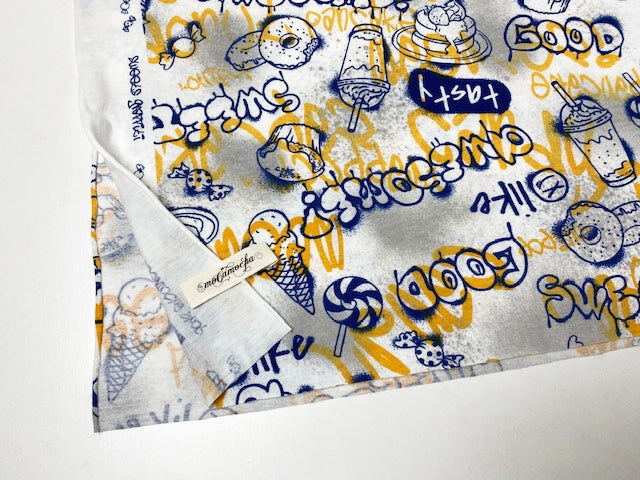 30/-コーマ度詰天竺ニット スイーツグラフィティ柄オフ×マンゴー